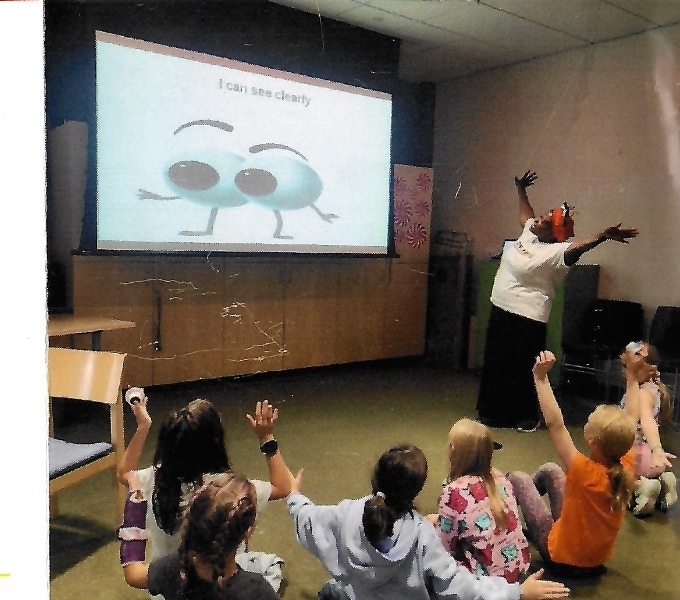Students engaged in joyful hands-on STEAM exploration